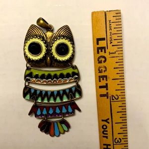 Brass toned metal owl